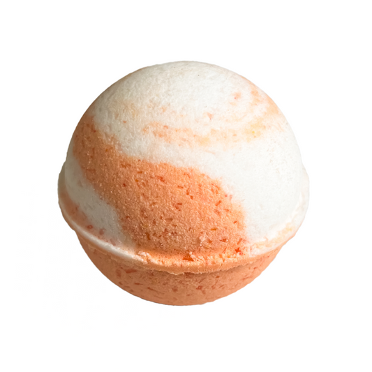 A single bath bomb with a marbled orange and white color pattern, designed for children.