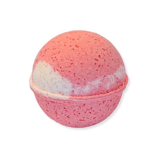A spherical bath bomb with a gradient of light red  to white, resembling a Christmas cookie in shape and color.